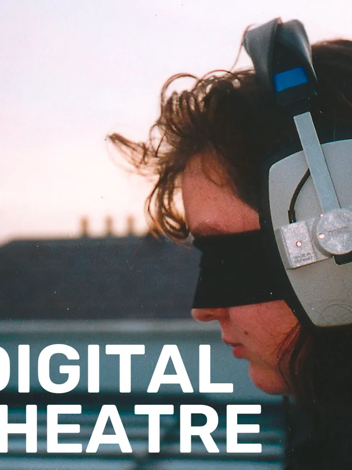 A woman wearing headphones and a blindfold