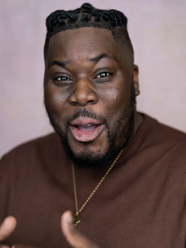 Hammed Animashaun against a purple background
