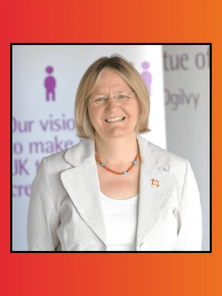 An image of Pauline Tambling CBE, against a red and orange gradient background.