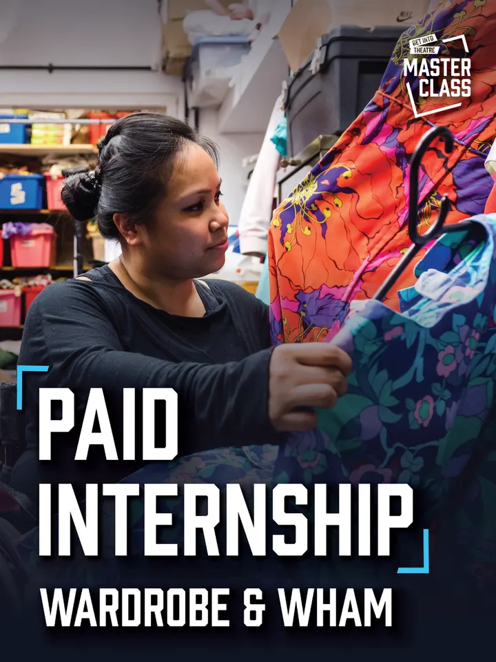 Graphic for a paid Wardrobe & WHAM internship. A woman in a theatre wardrobe room examines colourful floral costumes hanging on a rack, surrounded by shelves of costume-storage boxes. Large text reads “PAID INTERNSHIP — WARDROBE & WHAM,” with the Get Into Theatre Masterclass logo in the upper-right corner.